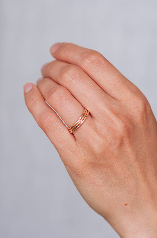 Thin hammered gold ring