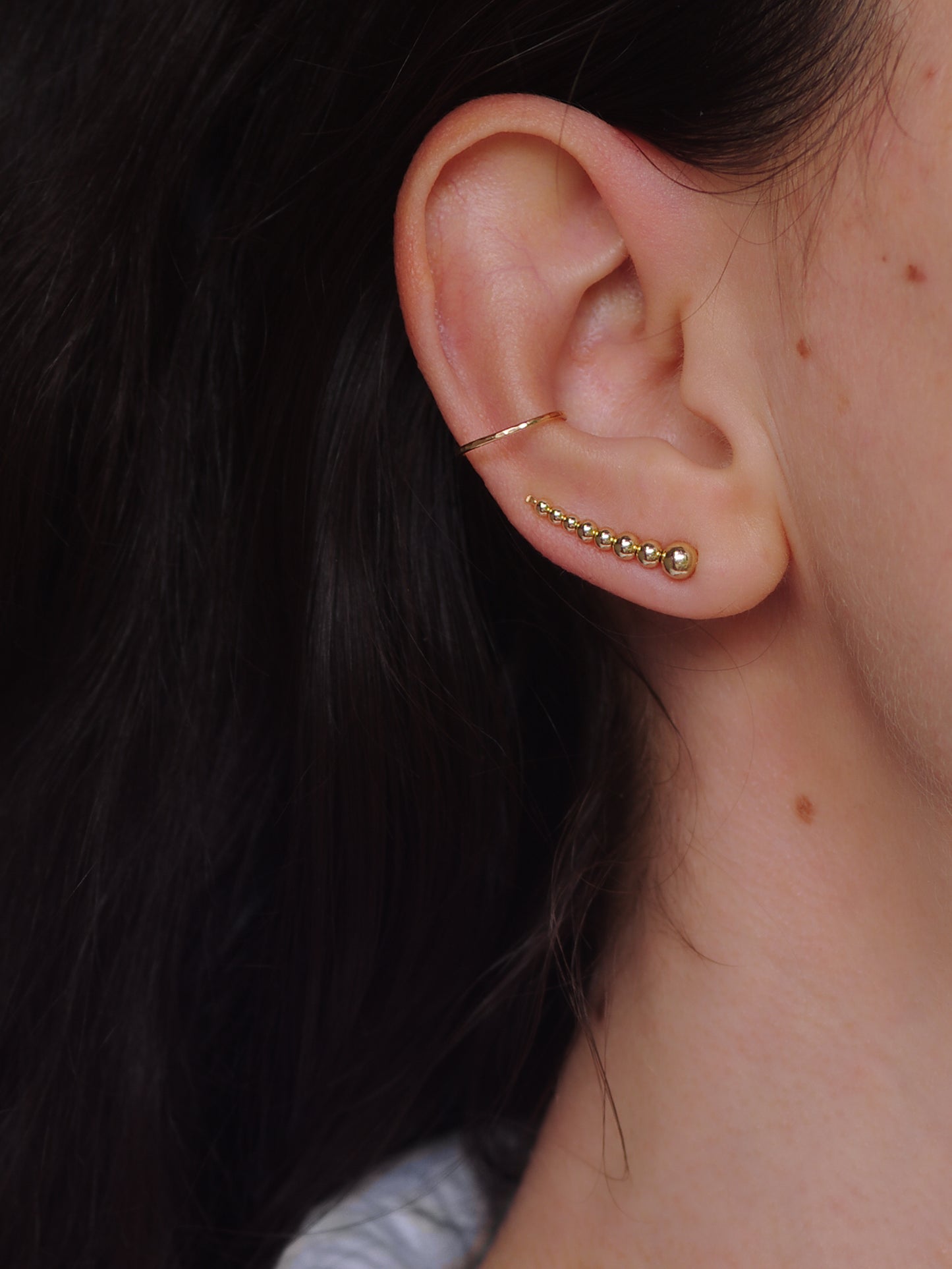 Polsini per orecchio singolo color oro